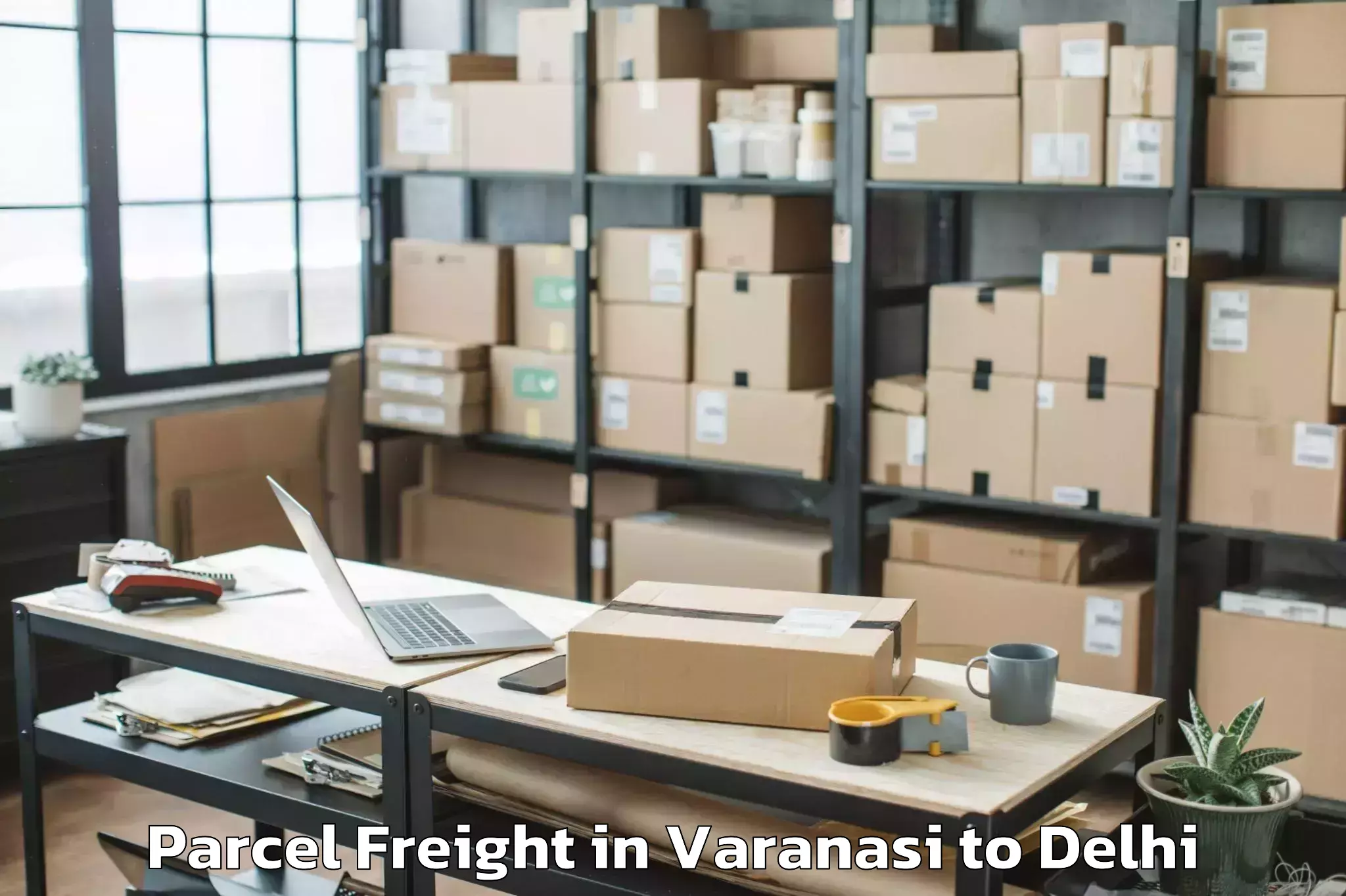 Varanasi to Flatted Factory Complex Okhla Parcel Freight